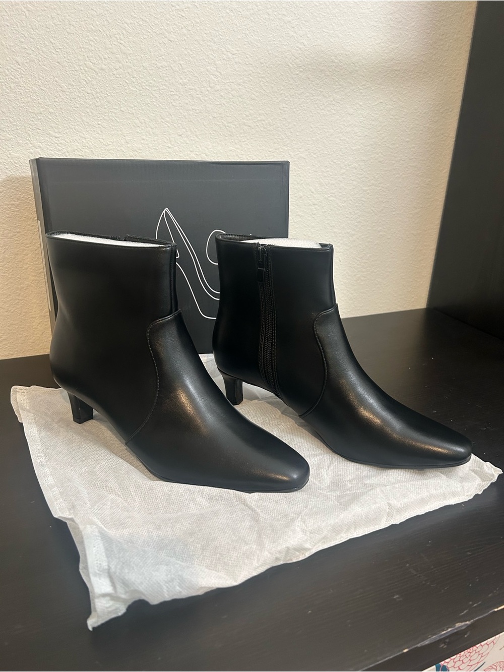 Sleek Black Leather Ankle Booties with Low Heel
